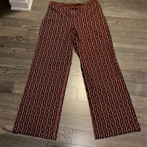 Stylish Black and Orange monogram Patterned women Pants